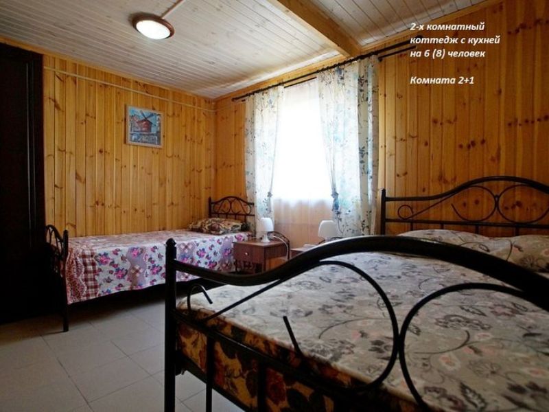 "Деревянные коттеджи На Лазурном" гостевой дом в Благовещенской